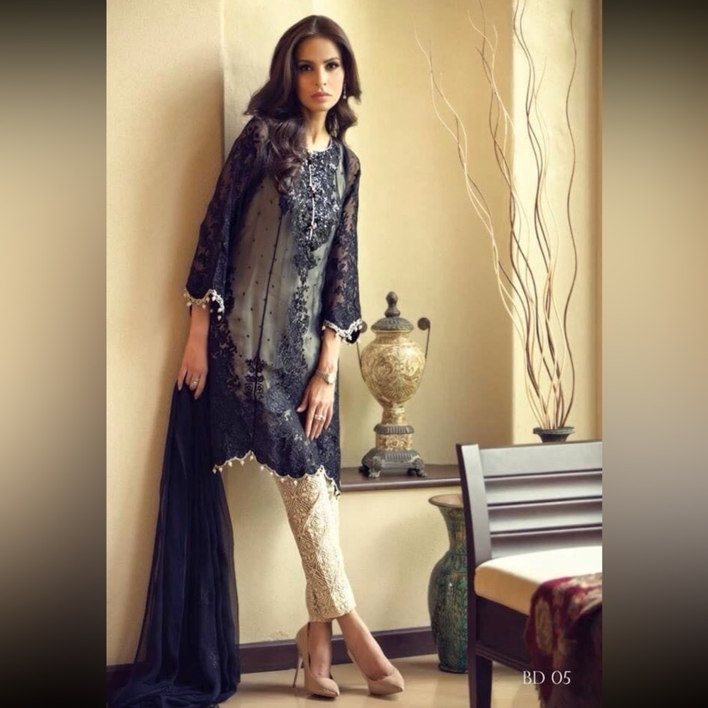 2 piece black and white Mariab inspired suit.